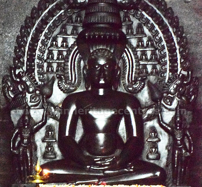 Ancient idol of Tirthankar Parshwanath in Sukhasana along with Choubis - 24 Tirthankaras, Parshwanath Digambar Jain Temple, Melsithamur, Villupuram District, Tamil Nadu, India.