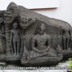 Ruined Tirthankar idol in padmasana - Jain Museum