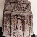 Chaturmukha Jain Tirthankara idol with Tirthankara seated in Padmasana, 10th- 11th Century.