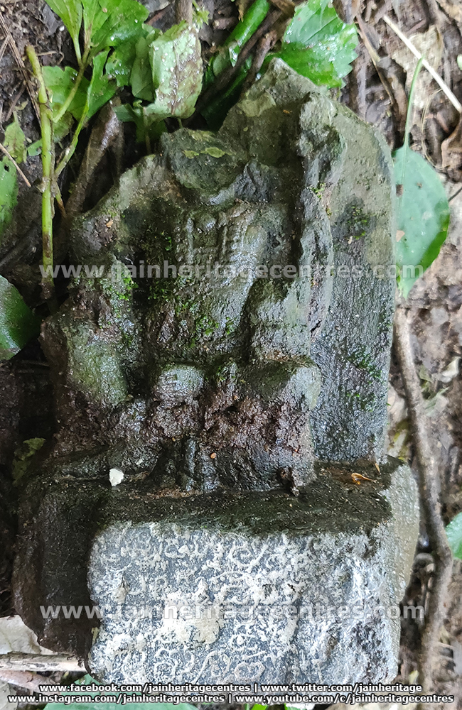 Inscription along the ruined pedestal below the Yakshi idol.
