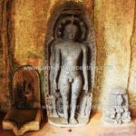 Tirthankar Parshwanath in kayotsarga along with other idols.